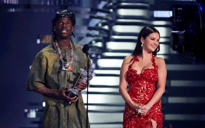 Rema and Selena Gomez presenting together at the MTV Music Awards. Rema and Selena Gomez presenting together at the MTV Music Awards.