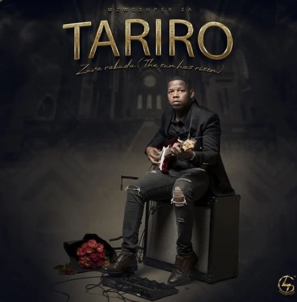 The cover of TARIRO's album, featuring Mzweshper_sa sitting on a guitar. The cover of TARIRO's album, featuring Mzweshper_sa sitting on a guitar.