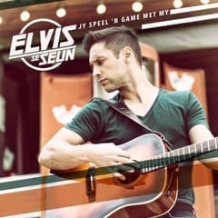 A person with short hair plays an acoustic guitar in front of an outdoor background, with text in the image reading "Elvis se Seun" and "Jy Speel 'n Game Met My.