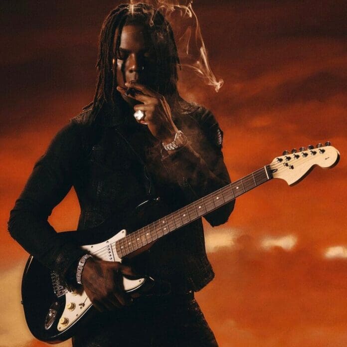 GoPCTX4XkAACNCl-1.jpeg A person with long hair, exuding a Style Rave vibe, smokes and holds an electric guitar against a vibrant orange-red backdrop, channeling the energetic essence of Afrobeats.