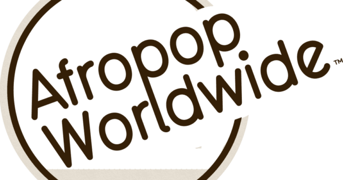 urlhttp3A2F2Fnpr-brightspot.s3.amazonaws.com2F932F2c2Fe3baf6c9447e9c2e8f4dc4b694782Fafopop.png Logo featuring "Afropop Worldwide" in brown letters on a circular design, reminiscent of the vibrant sounds you might catch on Boise State Public Radio.