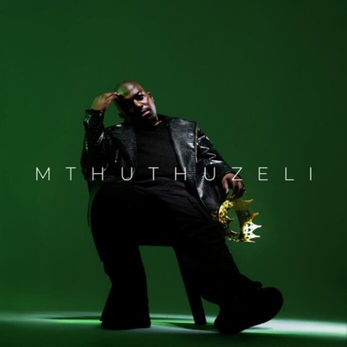 De-Mthuda-Aymos-–-Weekend-Aziwe-1-2.jpg A person in dark clothing sits on a chair against a green background, holding a crown, with "MTHUTHUZELI" and "Wena Baby" by De Mthuda & Sino Msolo elegantly displayed across the image.