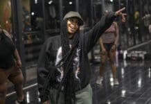 South Africa's amapiano has the world dancing – EWN A group of people in casual workout clothes follow an amapiano dance routine in a studio with mirrored walls; one woman in front points and smiles, capturing the spirit of world dancing inspired by South Africa.